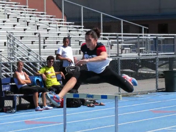 Jesse Labreck, University of Maine, Orono track and field heptathlete, jumps a hurdle Tuesday afternoon at UMaine. Jesse Labreck, University of Maine, Orono track and field heptathlete, jumps a hurdle Tuesday afternoon at UMaine.
