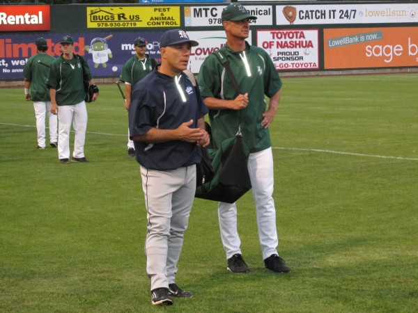 University of Maine baseball coach Steve Trimper (left) and Binghamton University coach Tim Sinicki chat while waiting to take their respective dugouts prior to Thursday's America East baseball tournament game in Lowell, Mass. University of Maine baseball coach Steve Trimper (left) and Binghamton University coach Tim Sinicki chat while waiting to take their respective dugouts prior to Thursday's America East baseball tournament game in Lowell, Mass.