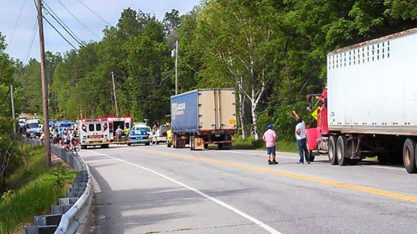 Rescue personnel tend to a Trek Across Maine cyclist on Route 2 in Hanover on Friday morning. Rescue personnel tend to a Trek Across Maine cyclist on Route 2 in Hanover on Friday morning.