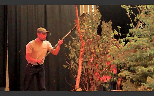 Chris Young of Greenville demonstrates how to create the sound of a bull thrashing through bushes with a canoe paddle during the 2013 Maine Moose Calling Championship in Greenville on June 15. Young won the competition. Chris Young of Greenville demonstrates how to create the sound of a bull thrashing through bushes with a canoe paddle during the 2013 Maine Moose Calling Championship in Greenville on June 15. Young won the competition.