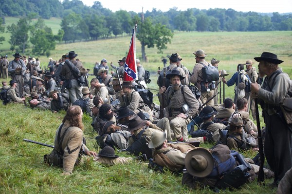 Actors playing Confederate soldiers congregate at a wood's edge awaiting orders to charge during a reenactment of The Battle of Little Roundtop during the Blue Gray Alliance events marking the 150th anniversary of the Battle of Gettysburg, in Gettysburg, Pennsylvania June 30, 2013. Actors playing Confederate soldiers congregate at a wood's edge awaiting orders to charge during a reenactment of The Battle of Little Roundtop during the Blue Gray Alliance events marking the 150th anniversary of the Battle of Gettysburg, in Gettysburg, Pennsylvania June 30, 2013.