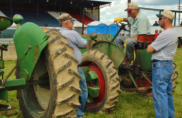 Southern Maine tractor fans and collectors Mike Pratt (left), Dale Fairbanks (center) and Mike Fairbanks were at the Northern Maine Fairgrounds over the weekend with their restored Oliver tractors to take part in the Old Iron Roundup. Southern Maine tractor fans and collectors Mike Pratt (left), Dale Fairbanks (center) and Mike Fairbanks were at the Northern Maine Fairgrounds over the weekend with their restored Oliver tractors to take part in the Old Iron Roundup.