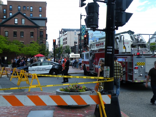 Pedestrians gawk at the Congress Street Building, also known as the State Theatre Building, in Downtown Portland on Sunday after the west-facing facade buckled for unknown reasons, sending debris falling to the sidewalk below. Pedestrians gawk at the Congress Street Building, also known as the State Theatre Building, in Downtown Portland on Sunday after the west-facing facade buckled for unknown reasons, sending debris falling to the sidewalk below.