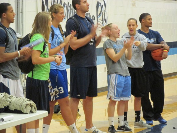 Current and former University of Maine student-athletes including (from left) Gerald McLemore, Liz Wood, Ali Nalivaika, Svetoslav Chetinov, Courtney Anderson, Lauren Bodine and Kendall James look on as awards are presented to players Thursday upon completion of the boys basketball summer camp in Orono. Current and former University of Maine student-athletes including (from left) Gerald McLemore, Liz Wood, Ali Nalivaika, Svetoslav Chetinov, Courtney Anderson, Lauren Bodine and Kendall James look on as awards are presented to players Thursday upon completion of the boys basketball summer camp in Orono.