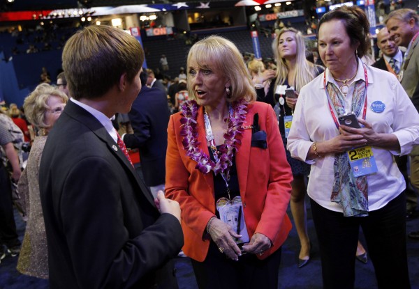 Arizona Gov. Jan Brewer, shown here greeting delegates Aug. 28, 2012, at the Tampa Bay Times Forum in Tampa, Fla., is one of several Republican governors pushing state legislators to approve Medicaid expansion allowed under the federal Affordable Care Act. Arizona Gov. Jan Brewer, shown here greeting delegates Aug. 28, 2012, at the Tampa Bay Times Forum in Tampa, Fla., is one of several Republican governors pushing state legislators to approve Medicaid expansion allowed under the federal Affordable Care Act.