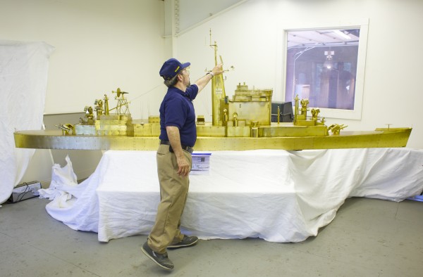 An Orland man, with the help of a metal fabrication company, has restored a 14-foot long brass boat model formerly used by the Navy to test antenna arrays on warships. An Orland man, with the help of a metal fabrication company, has restored a 14-foot long brass boat model formerly used by the Navy to test antenna arrays on warships.