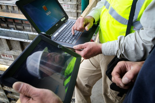 Portland code enforcement officer Don McPherson (left) logs into his laptop Friday as he goes over electronic site plans with Ed Hume of PC Construction on Diamond Street. McPherson now files his code inspections from the field with his laptop. Portland code enforcement officer Don McPherson (left) logs into his laptop Friday as he goes over electronic site plans with Ed Hume of PC Construction on Diamond Street. McPherson now files his code inspections from the field with his laptop.