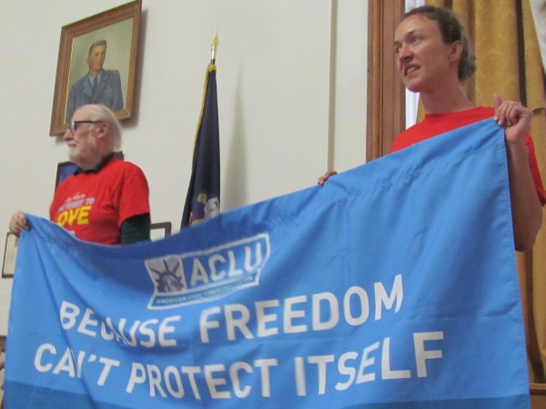 Douglas Cowie (right) and Rachel Healy of the ACLU of Maine hold a banner celebrating the U.S. Supreme Court's decision Wednesday striking down the Defense of Marriage Act as unconstitutional during a rally at Portland City Hall. Douglas Cowie (right) and Rachel Healy of the ACLU of Maine hold a banner celebrating the U.S. Supreme Court's decision Wednesday striking down the Defense of Marriage Act as unconstitutional during a rally at Portland City Hall.