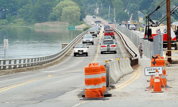 A cyclist uses the sidewalk during the Martin's Point Bridge construction on Route 1 between Falmouth and Portland on Wednesday. An altercation between a motorist and a cyclist has raised awareness of the hazardous conditions of using the popular commuter route. A cyclist uses the sidewalk during the Martin's Point Bridge construction on Route 1 between Falmouth and Portland on Wednesday. An altercation between a motorist and a cyclist has raised awareness of the hazardous conditions of using the popular commuter route.