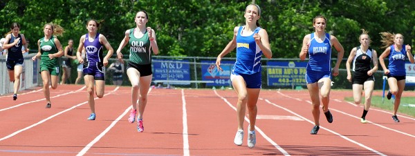 Hermon's Kaitlin Saulter, center, pulls away from the field in the final stretch of the 400 meter during Saturday's Class B championship meet at Morse High School in Bath. To her left, finishing second, is Old Town's Kelsey Maxim. Hermon's Kaitlin Saulter, center, pulls away from the field in the final stretch of the 400 meter during Saturday's Class B championship meet at Morse High School in Bath. To her left, finishing second, is Old Town's Kelsey Maxim.