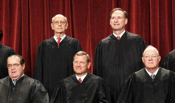 U.S. Supreme Court justices pose for a photo at the Supreme Court in Washington. Four Republican-appointed justices, front row from left, Antonin Scalia, Chief Justice John Roberts, Anthony M. Kennedy and top right, Samuel Alito Jr., at top left is Justice Stephen Breyer. U.S. Supreme Court justices pose for a photo at the Supreme Court in Washington. Four Republican-appointed justices, front row from left, Antonin Scalia, Chief Justice John Roberts, Anthony M. Kennedy and top right, Samuel Alito Jr., at top left is Justice Stephen Breyer.