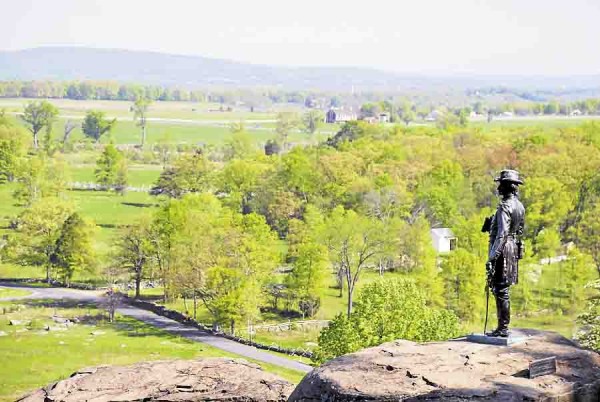 The statue of Union Gen. Gouverneur K. Warren stands on Little Round Top and overlooks Gettysburg National Military Park in Pennsylvania. Maine regiments fought within sight of where the statue stands today. The statue of Union Gen. Gouverneur K. Warren stands on Little Round Top and overlooks Gettysburg National Military Park in Pennsylvania. Maine regiments fought within sight of where the statue stands today.