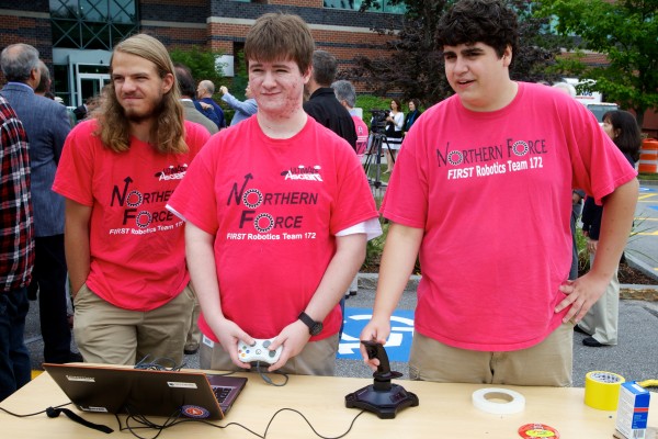 Joseph Martin (from left) Arthur Lockman and Alex Alling of the Northern Force Robotics team operate their disc-flinging mobile unit in the parking lot at Fairchild Semiconductor in South Portland Thursday as part of the launch of the Robotics Institute of Maine. Joseph Martin (from left) Arthur Lockman and Alex Alling of the Northern Force Robotics team operate their disc-flinging mobile unit in the parking lot at Fairchild Semiconductor in South Portland Thursday as part of the launch of the Robotics Institute of Maine.