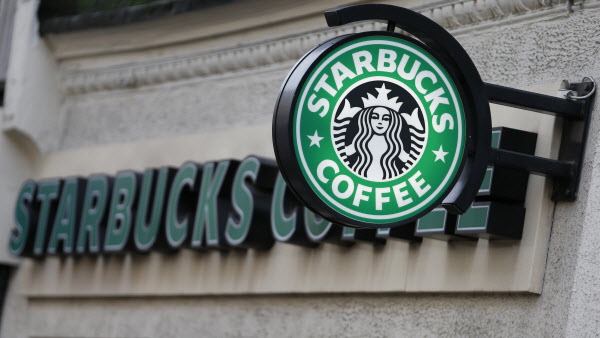 A sign outside a Starbucks Coffee shop in central London Dec. 3, 2012. The popular coffee chain will begin posting calorie counts on its menu boards and food tags beginning June 25. A sign outside a Starbucks Coffee shop in central London Dec. 3, 2012. The popular coffee chain will begin posting calorie counts on its menu boards and food tags beginning June 25.