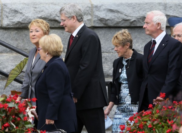 Canadian Prime Minister Stephen Harper, 3rd left, Quebec Premier Pauline Marois, left, Lac Megantic mayor Colette Roy-Laroche, 2nd left, Governor General David Johnston, right, and his wife Sharon arrive at Sainte-Agnes Church for the memorial service to honor the victims of the train derailment in Lac Megantic, Quebec July 27, 2013. Canadian Prime Minister Stephen Harper, 3rd left, Quebec Premier Pauline Marois, left, Lac Megantic mayor Colette Roy-Laroche, 2nd left, Governor General David Johnston, right, and his wife Sharon arrive at Sainte-Agnes Church for the memorial service to honor the victims of the train derailment in Lac Megantic, Quebec July 27, 2013.
