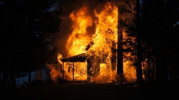 A camp on Sandy Shore Lane in Norway burns Wednesday night. A camp on Sandy Shore Lane in Norway burns Wednesday night.