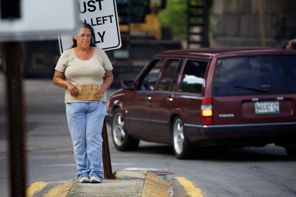 Kelly Noble panhandles in the median strip on the corner of St. John Street and Park Avenue in Portland last year. Kelly Noble panhandles in the median strip on the corner of St. John Street and Park Avenue in Portland last year.