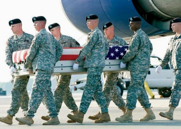 A U.S. ARMY carry team transfers the remains of Army Sgt. Corey E. Garver of Topsham on June 25, at Dover (Del.) Air Force Base. Garver, who attended Mt. Ararat High School, was killed June 23 when his unit came under fire in Afghanistan. He was buried in Arlington National Cemetery on July 10. A U.S. ARMY carry team transfers the remains of Army Sgt. Corey E. Garver of Topsham on June 25, at Dover (Del.) Air Force Base. Garver, who attended Mt. Ararat High School, was killed June 23 when his unit came under fire in Afghanistan. He was buried in Arlington National Cemetery on July 10.