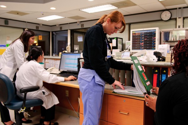 Clinical Nurse Elise Ross stands in front of the nurses station central monitor for patient vital signs in the Neuro Intensive Care Unit in MedStar Washington Hospital Center in Washington, D.C. on June 25, 2013. The Neuro ICU has 14 beds that are often full, with an almost constant ringing of alarms throughout the day. Clinical Nurse Elise Ross stands in front of the nurses station central monitor for patient vital signs in the Neuro Intensive Care Unit in MedStar Washington Hospital Center in Washington, D.C. on June 25, 2013. The Neuro ICU has 14 beds that are often full, with an almost constant ringing of alarms throughout the day.
