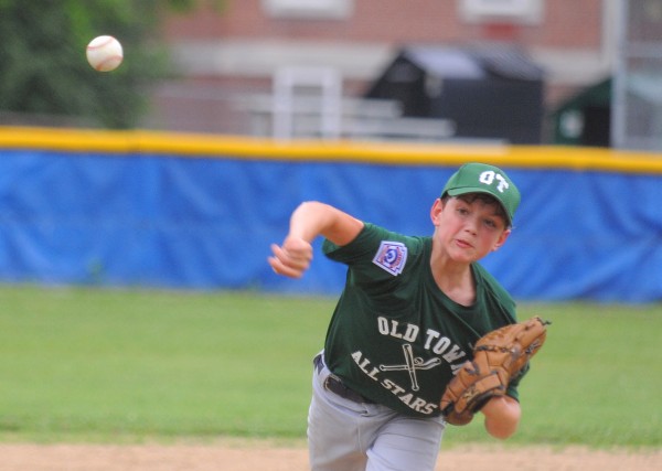 Old Town's Brenden Gassaway pitches during a District 3 Little League all-star game against Bangor West in Bangor Monday afternoon. Old Town's Brenden Gassaway pitches during a District 3 Little League all-star game against Bangor West in Bangor Monday afternoon.