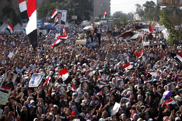 Supporters of deposed Egyptian President Mohamed Morsi shout slogans as they rally at the Raba El-Adwyia square where they are camping in Cairo July 8, 2013. Supporters of deposed Egyptian President Mohamed Morsi shout slogans as they rally at the Raba El-Adwyia square where they are camping in Cairo July 8, 2013.