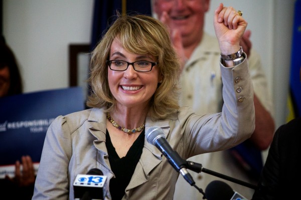 Former Arizona Rep. Gabrielle Giffords raises her hand as the crowd applauds Saturday at Portland City Hall. She came to Portland to support what she considers common sense gun control measures. Former Arizona Rep. Gabrielle Giffords raises her hand as the crowd applauds Saturday at Portland City Hall. She came to Portland to support what she considers common sense gun control measures.