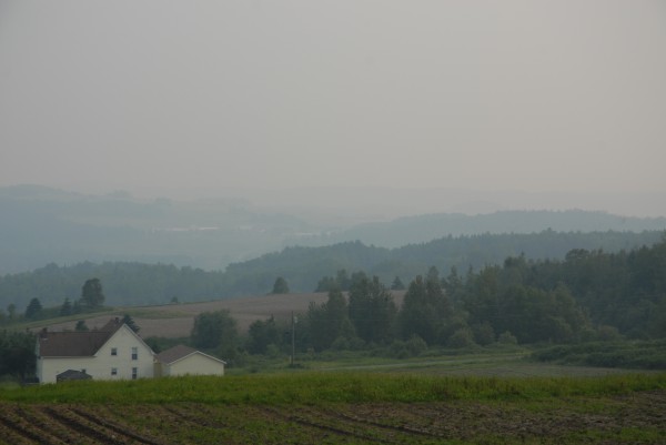 Smoke from forest fires in northwest Quebec have created hazy conditions in northern Maine, obscuring hills looking westward over the St. John Valley. Smoke from forest fires in northwest Quebec have created hazy conditions in northern Maine, obscuring hills looking westward over the St. John Valley.