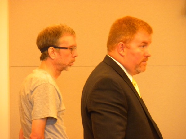 John A. Weckerly (left) stands on July 25, 2013, at the Penobscot County Judicial Center with his attorney Kirk Bloomer on the first day of his trial. Weckerly has been charged with 12 crimes, including four arsons, one that destroyed a fire marshal's car. John A. Weckerly (left) stands on July 25, 2013, at the Penobscot County Judicial Center with his attorney Kirk Bloomer on the first day of his trial. Weckerly has been charged with 12 crimes, including four arsons, one that destroyed a fire marshal's car.
