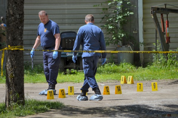 State police evidence team members mark off evidence outside of 24 Main St. in Detroit late Thursday morning. State police evidence team members mark off evidence outside of 24 Main St. in Detroit late Thursday morning.