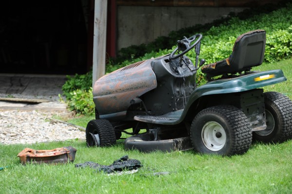 A lawn mower that was being worked on by 16-year-old Lucas Ashmore sits in the yard at 394 Jacob Buck Pond Road in Bucksport on Tuesday after the Bucksport fire department extinguished it. A lawn mower that was being worked on by 16-year-old Lucas Ashmore sits in the yard at 394 Jacob Buck Pond Road in Bucksport on Tuesday after the Bucksport fire department extinguished it.