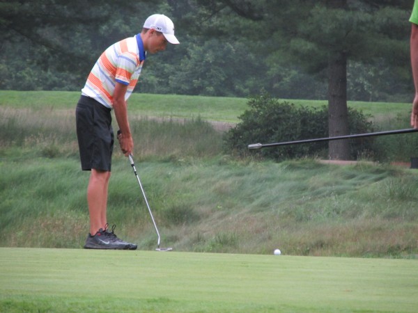 Drew Powell of Bangor putts on the 17th hole Wednesday during the Maine Amateur Championship golf tournament at Augusta Country Club. Drew Powell of Bangor putts on the 17th hole Wednesday during the Maine Amateur Championship golf tournament at Augusta Country Club.