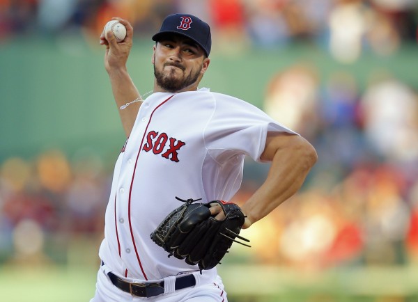 Boston's Brandon Workman pitches against the Seattle Mariners in the first inning Tuesday night at Fenway Park in Boston. Boston's Brandon Workman pitches against the Seattle Mariners in the first inning Tuesday night at Fenway Park in Boston.
