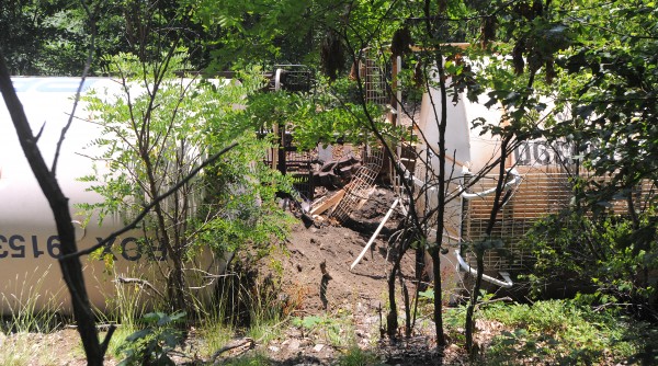 Two of the railroad cars that fell on their side during the derailment on the Bangor-Veazie town line. Two of the railroad cars that fell on their side during the derailment on the Bangor-Veazie town line.