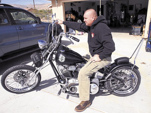 Marine Master Sgt. Ryan C. Love of Frankfort sits on his Harley-Davidson, which he loved to ride when home from foreign duty. Love died unexpectedly last July; a benefit motorcycle ride to honor his memory will take place Saturday, July 20, to help raise funds for the Wounded Warrior Project and the Semper Fi Fund.
Marine Master Sgt. Ryan C. Love of Frankfort sits on his Harley-Davidson, which he loved to ride when home from foreign duty. Love died unexpectedly last July; a benefit motorcycle ride to honor his memory will take place Saturday, July 20, to help raise funds for the Wounded Warrior Project and the Semper Fi Fund.