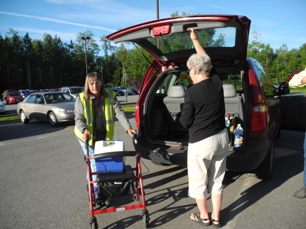 Mary Putansu (left) of Belfast heads to work this week at Little River Apparel after getting a ride by Waldo County Transportation driver Winnie Fowler. The state's August 1 switch to a new MaineCare transportation brokering, or dispatching, system has meant that many elderly, ill and impoverished Mainers have missed medical and other appointments in the last week. Mary Putansu (left) of Belfast heads to work this week at Little River Apparel after getting a ride by Waldo County Transportation driver Winnie Fowler. The state's August 1 switch to a new MaineCare transportation brokering, or dispatching, system has meant that many elderly, ill and impoverished Mainers have missed medical and other appointments in the last week.