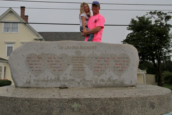 Richard Gray and his daughter Jayden stand behind the Rock of Angels memorial that will be sent to Newtown, Conn., in memorial of the teachers and students killed during the Sandy Hook Elementary School shooting. Richard Gray and his daughter Jayden stand behind the Rock of Angels memorial that will be sent to Newtown, Conn., in memorial of the teachers and students killed during the Sandy Hook Elementary School shooting.