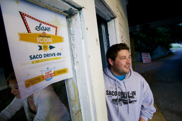 Ry Russell, 23, owner of the Saco Drive-In theater, gets the ticket booth ready with Corinne Ericson on Aug. 14, 2013. Ry Russell, 23, owner of the Saco Drive-In theater, gets the ticket booth ready with Corinne Ericson on Aug. 14, 2013.