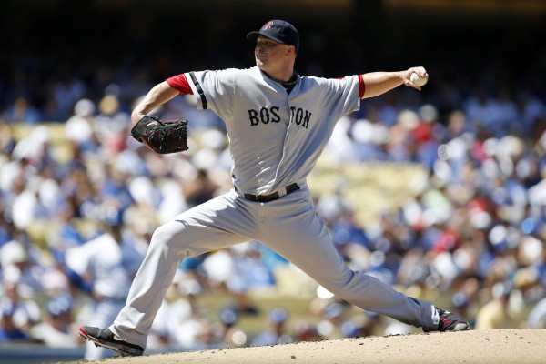 Boston Red Sox starting pitcher Jon Lester delivers against the Los Angeles Dodgers on Saturday during the second inning of an MLB Interleague baseball game in Los Angeles. Boston won 4-2. Boston Red Sox starting pitcher Jon Lester delivers against the Los Angeles Dodgers on Saturday during the second inning of an MLB Interleague baseball game in Los Angeles. Boston won 4-2.