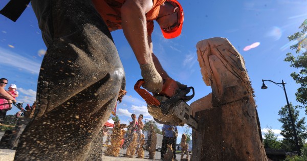 Chainsaw artist Pasco Grove of Searsport works on a carving during the KahBang Festival in Bangor on Saturday. Chainsaw artist Pasco Grove of Searsport works on a carving during the KahBang Festival in Bangor on Saturday.