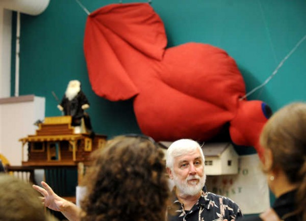 Loren Coleman explains the International Cryptozoology Museum in Portland to visitors from Buffalo, N.Y., under a colossal squid constructed by artist Sarah McCann. The squid's dimensions match a real animal found off New Zealand in 2007. Loren Coleman explains the International Cryptozoology Museum in Portland to visitors from Buffalo, N.Y., under a colossal squid constructed by artist Sarah McCann. The squid's dimensions match a real animal found off New Zealand in 2007.
