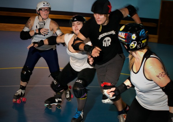 Women roller derby skaters help members of a new men's team get ready for their first bout in Portland Sunday night. From left is Amy Martin, "Punchy O'Guts," Jodie Keenan, "Brannigan's Law," Chris Ziobrowski, "FearUs Oxide," and K.T. Long "KTNT." The Casco Bay Gentlemenâs Derby is set to play the Vermont Mean Mountain Boys October 5 at the Portland Expo. Women roller derby skaters help members of a new men's team get ready for their first bout in Portland Sunday night. From left is Amy Martin, "Punchy O'Guts," Jodie Keenan, "Brannigan's Law," Chris Ziobrowski, "FearUs Oxide," and K.T. Long "KTNT." The Casco Bay Gentlemenâs Derby is set to play the Vermont Mean Mountain Boys October 5 at the Portland Expo.