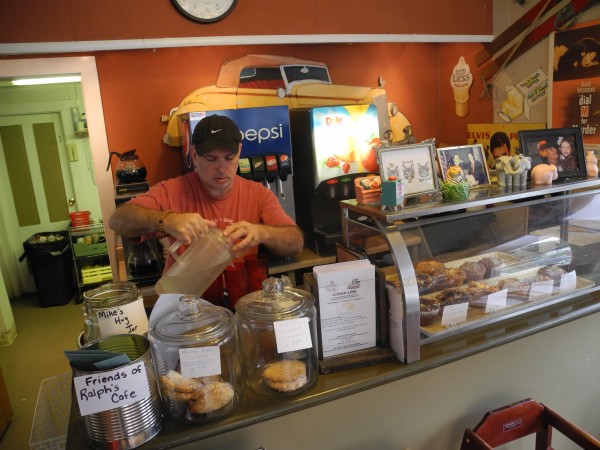 Mike Switzer, a co-owner at Ralph's Cafe, worked behind the counter this week. The community is rallying behind the restaurant, whose owners recently learned that they faced a $35,000 - $40,000 bill to install a new septic system Mike Switzer, a co-owner at Ralph's Cafe, worked behind the counter this week. The community is rallying behind the restaurant, whose owners recently learned that they faced a $35,000 - $40,000 bill to install a new septic system