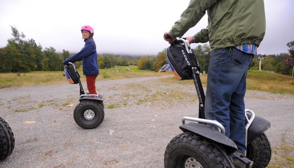 Meghan Price, (left) Segway guide and office manager, Sugarloaf Outpost Adventure Center and Ethan Austin, Sugarloaf Communications Manager demonstrate the Segway tour at Sugarloaf resort. Meghan Price, (left) Segway guide and office manager, Sugarloaf Outpost Adventure Center and Ethan Austin, Sugarloaf Communications Manager demonstrate the Segway tour at Sugarloaf resort.