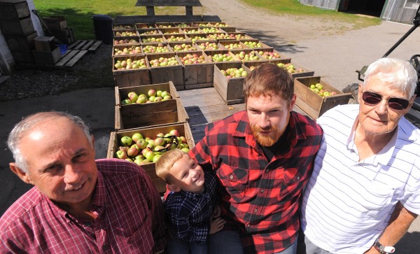 Four generations at the Conant Orchards in Etna. The orchard was started by Alphonso Conant in 1945 and has been in the family ever since. Currently it is owned by Clint Parsons (second from right), but before him, his father, Michael Parsons (left), and his grandfather, Vincent Conant (right), owned the family farm. They grow 19 varieties of apples and sell cider, pumpkins and pears, just to name few of the items available at the farm's store. Also pictured is Clint's son, 3-year-old Ethan Michael Parsons. Four generations at the Conant Orchards in Etna. The orchard was started by Alphonso Conant in 1945 and has been in the family ever since. Currently it is owned by Clint Parsons (second from right), but before him, his father, Michael Parsons (left), and his grandfather, Vincent Conant (right), owned the family farm. They grow 19 varieties of apples and sell cider, pumpkins and pears, just to name few of the items available at the farm's store. Also pictured is Clint's son, 3-year-old Ethan Michael Parsons.