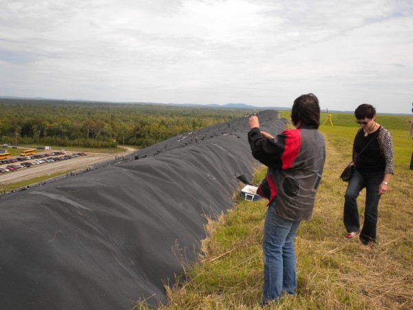 State Rep. Janice Cooper (left), D-Yarmouth, takes a photo with her cellphone from the top of the Juniper Ridge Landfill on Sept. 7, 2013, as Rep. Gay Grant, D-Gardiner, joins her. The two representatives are on the Legislature's Joint Standing Committee on Environment and Natural Resources, which has been tasked with reviewing the state's solid waste policy. State Rep. Janice Cooper (left), D-Yarmouth, takes a photo with her cellphone from the top of the Juniper Ridge Landfill on Sept. 7, 2013, as Rep. Gay Grant, D-Gardiner, joins her. The two representatives are on the Legislature's Joint Standing Committee on Environment and Natural Resources, which has been tasked with reviewing the state's solid waste policy.