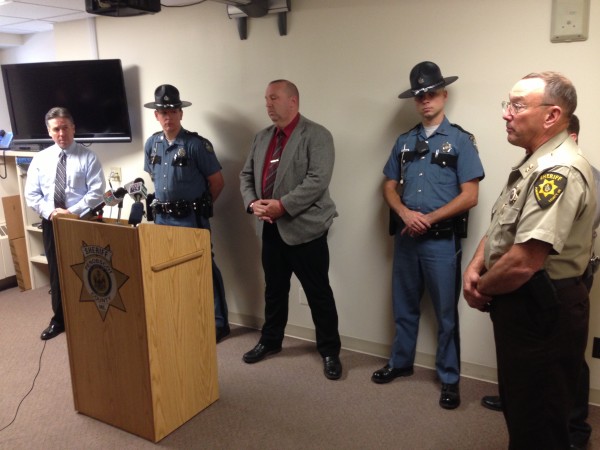 Penobscot County Sheriff Glenn Ross (right) held a press conference to announce the charges brought against Benjamin Sprague, Chester Birmingham and Donald Getchell Jr., the suspects in a robbery in Orrington and an attempted robbery at Bob's Kozy Korner Store in Orrington. Birmingham and Getchell Jr. were also charged with a robbery at a Glenburn convenience store. Penobscot County Sheriff Glenn Ross (right) held a press conference to announce the charges brought against Benjamin Sprague, Chester Birmingham and Donald Getchell Jr., the suspects in a robbery in Orrington and an attempted robbery at Bob's Kozy Korner Store in Orrington. Birmingham and Getchell Jr. were also charged with a robbery at a Glenburn convenience store.