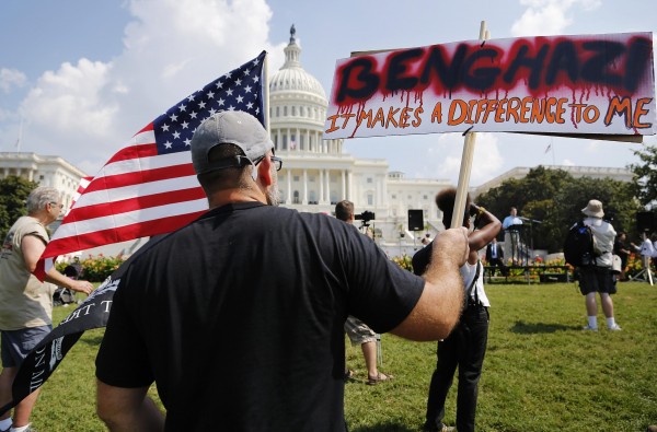 A small group of protesters rally to protest against the U.S. government's response to the deaths of four Americans during an Islamist militant attack on a U.S. diplomatic compound in Benghazi, Libya, last year, on the West Lawn of the U.S. Capitol in Washington, September 11, 2013. A small group of protesters rally to protest against the U.S. government's response to the deaths of four Americans during an Islamist militant attack on a U.S. diplomatic compound in Benghazi, Libya, last year, on the West Lawn of the U.S. Capitol in Washington, September 11, 2013.