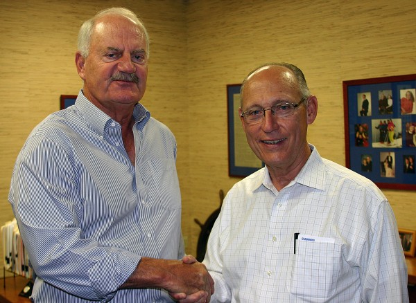 Peter Vigue, right, chairman and CEO of Cianbro, shakes hands with James Van Hoften, a former NASA astronaut and Cianbro's newest board member. Peter Vigue, right, chairman and CEO of Cianbro, shakes hands with James Van Hoften, a former NASA astronaut and Cianbro's newest board member.