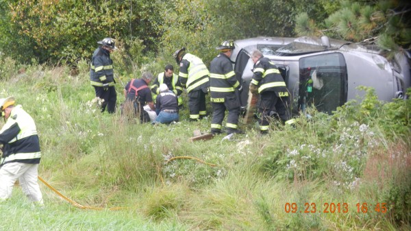 A Carmel woman was injured late Monday afternoon after she lost control of her silver sedan while trying to avoid a collision with a green car that cut into her path on Interstate 95. A Carmel woman was injured late Monday afternoon after she lost control of her silver sedan while trying to avoid a collision with a green car that cut into her path on Interstate 95.