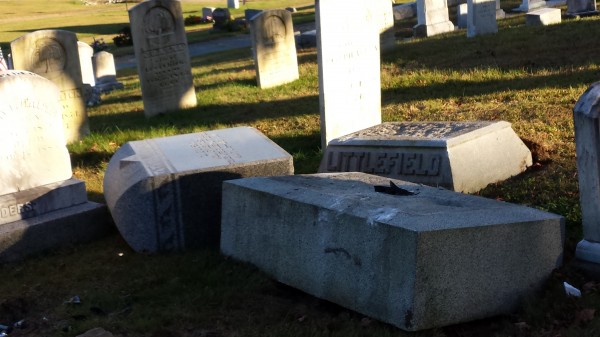 The Littlefield family stone was broken off its base during a demolition derby-style fight between a mother and daughter from Winthrop at the Monmouth Ridge Cemetery on Friday night, according to authorities. The Littlefield family stone was broken off its base during a demolition derby-style fight between a mother and daughter from Winthrop at the Monmouth Ridge Cemetery on Friday night, according to authorities.